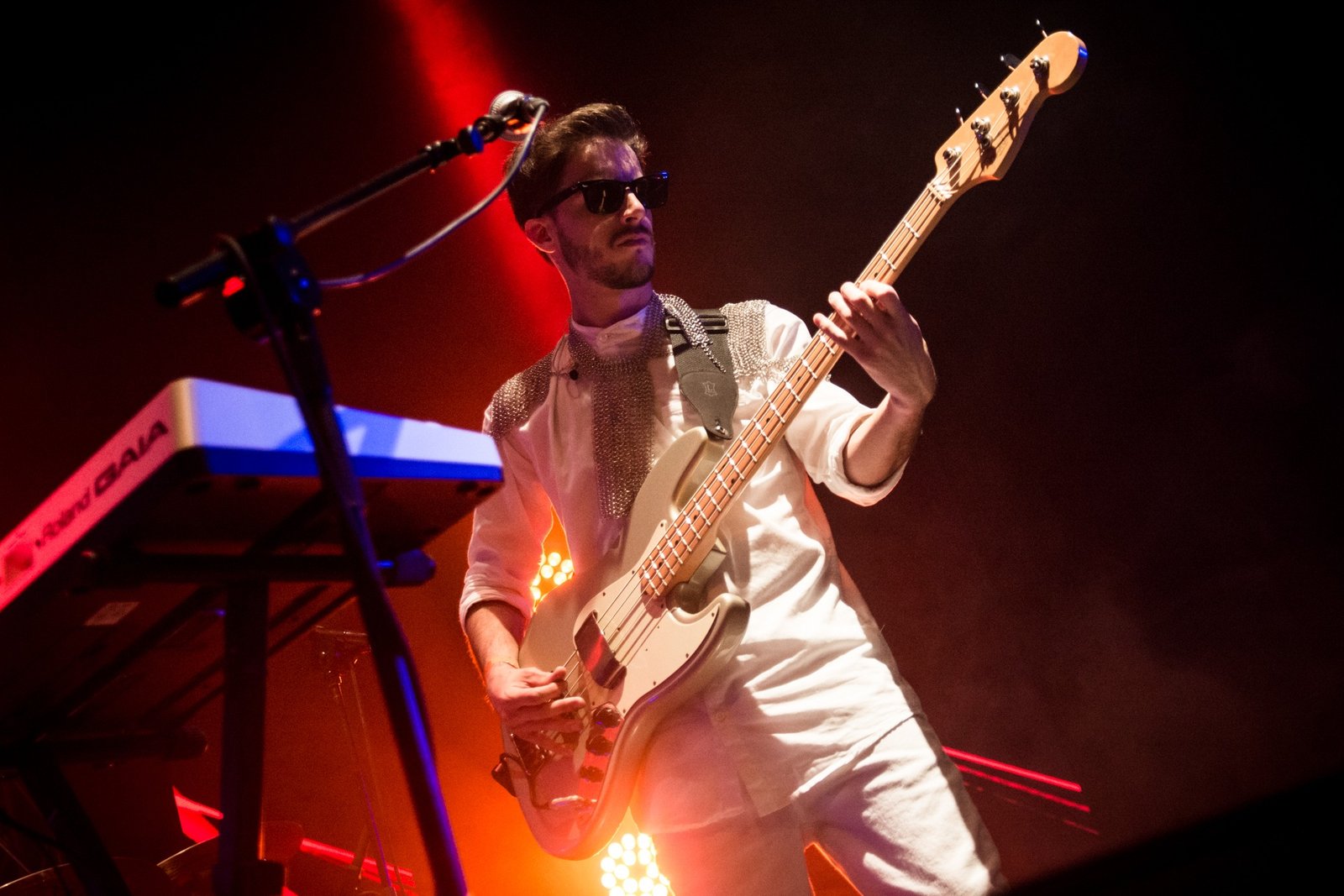 Leandro Juarez on stage under red light